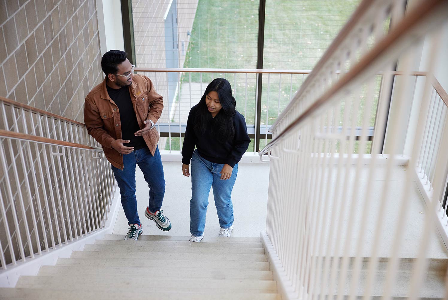 Photo of students walking up the stairs
