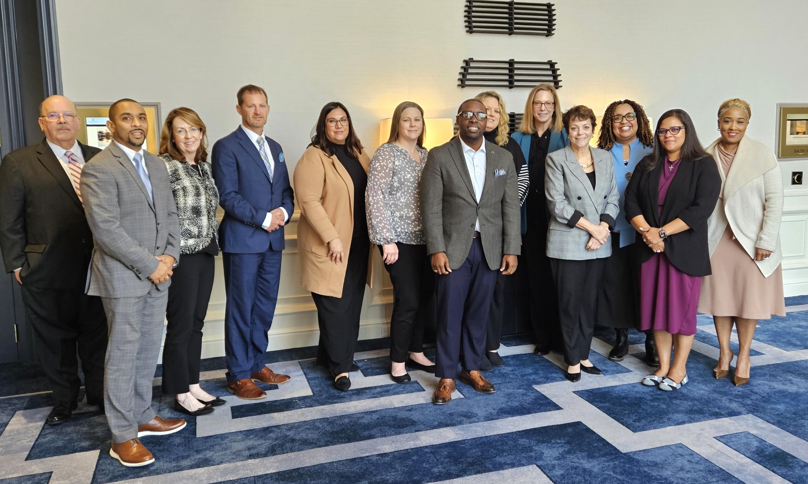 AACC's College Readiness Commission group gathered in a lobby,