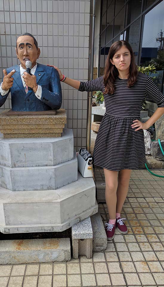 Robin Jungwirth with statue of Barack Obama