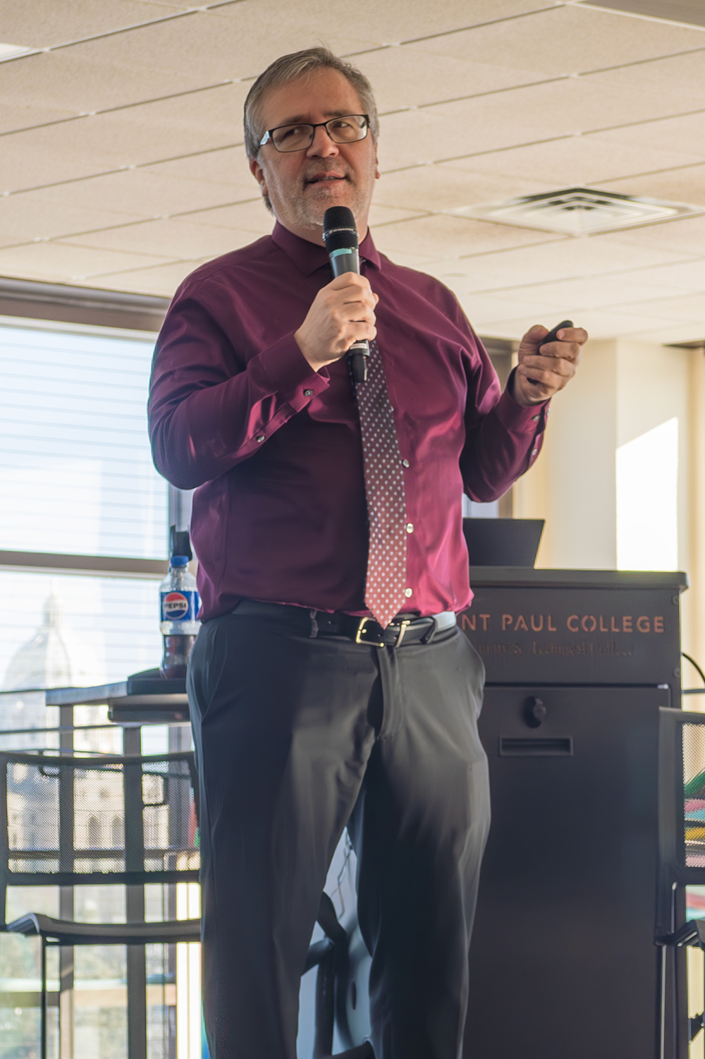 Chad Dull speaking in front of an SPC podium