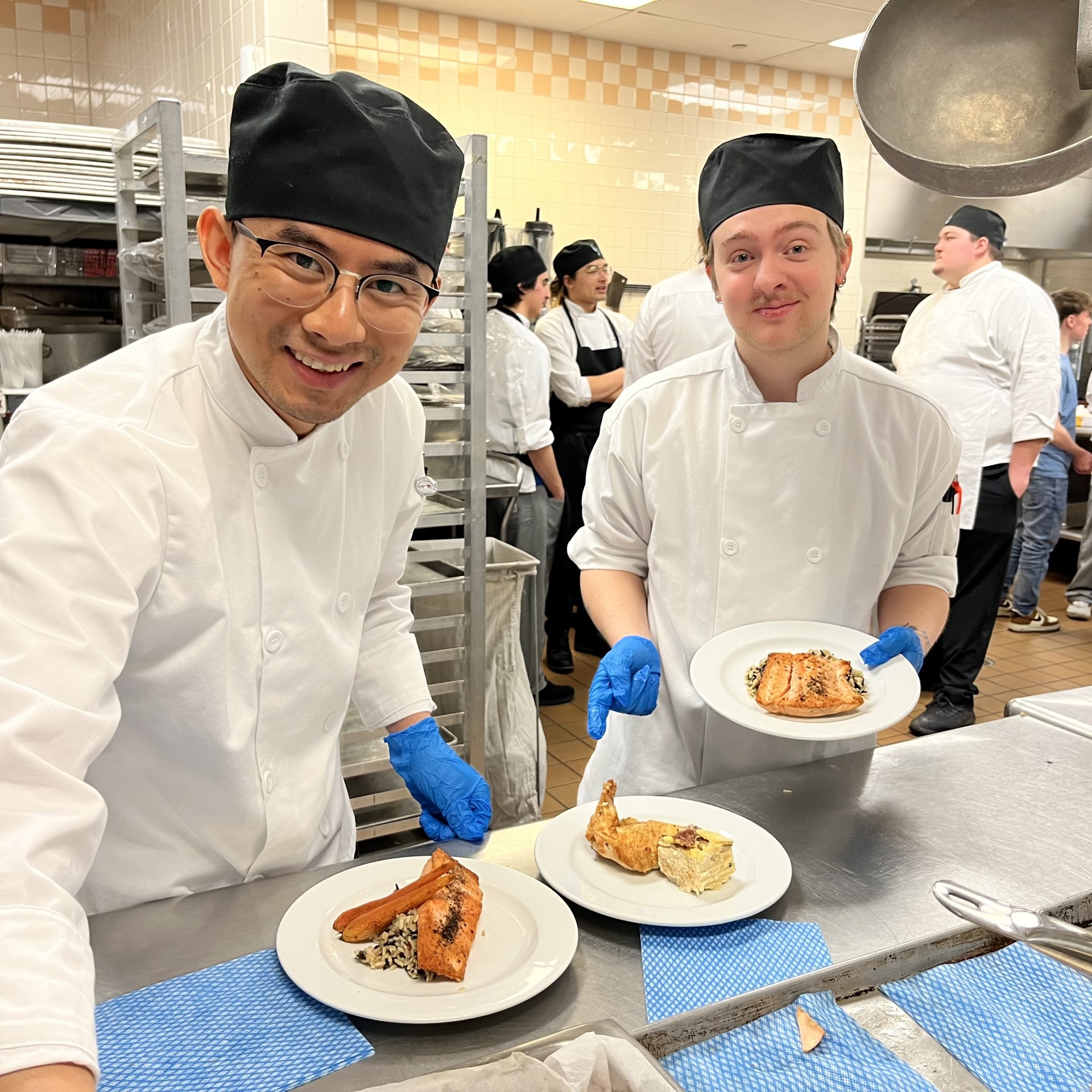 Culinary Students showing off their work.