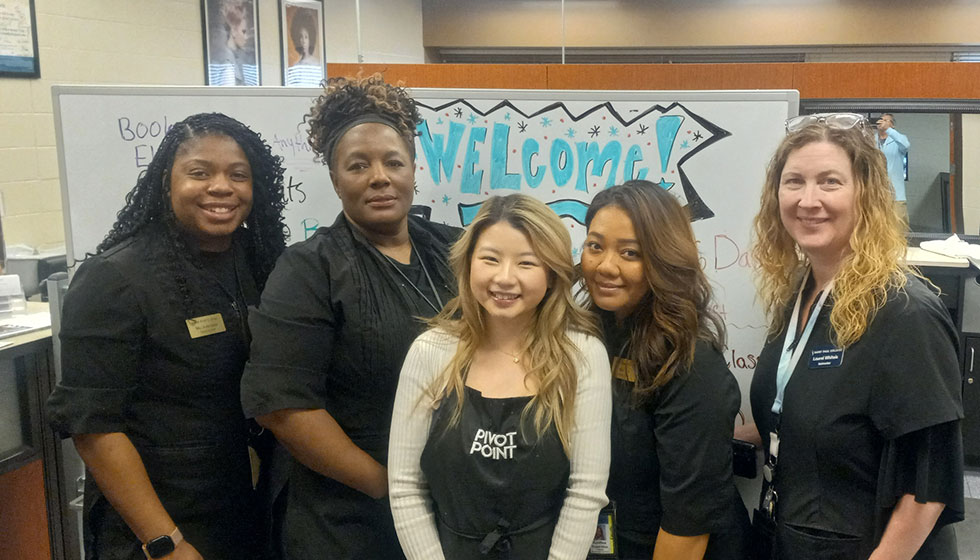 Joua Vue and cosmetology instructors